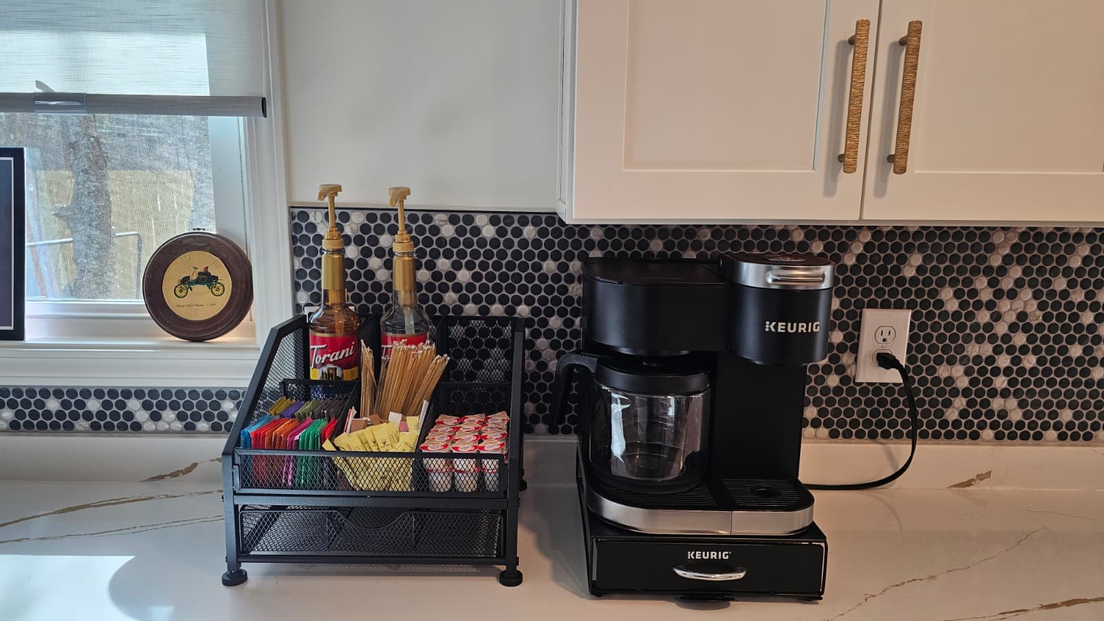 Stocked coffee bar with espresso, syrups, and morning essentials at Mojo Manor